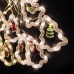 Світлодіодна гірлянда-завіса прозорий дріт Фігурки в ялинці 10 LED Magic Lights 3 х 0.6 м теплий білий