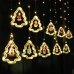 Світлодіодна гірлянда-завіса прозорий дріт Фігурки в ялинці 10 LED Magic Lights 3 х 0.6 м теплий білий