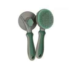 Щітка-пуходерка для вичісування шерсті для котів та собак зелений